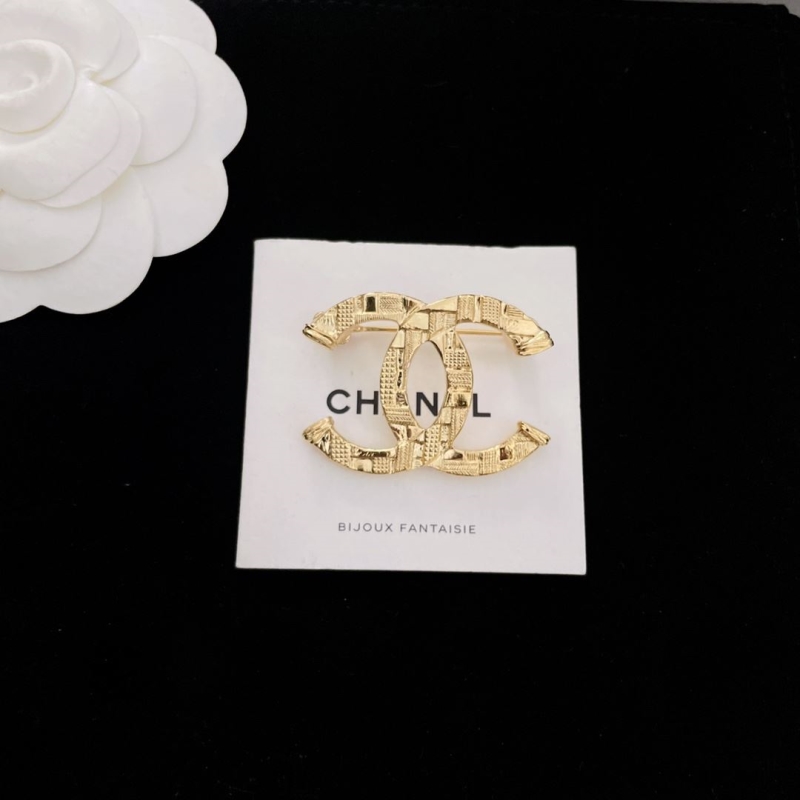 Ch**el brooches